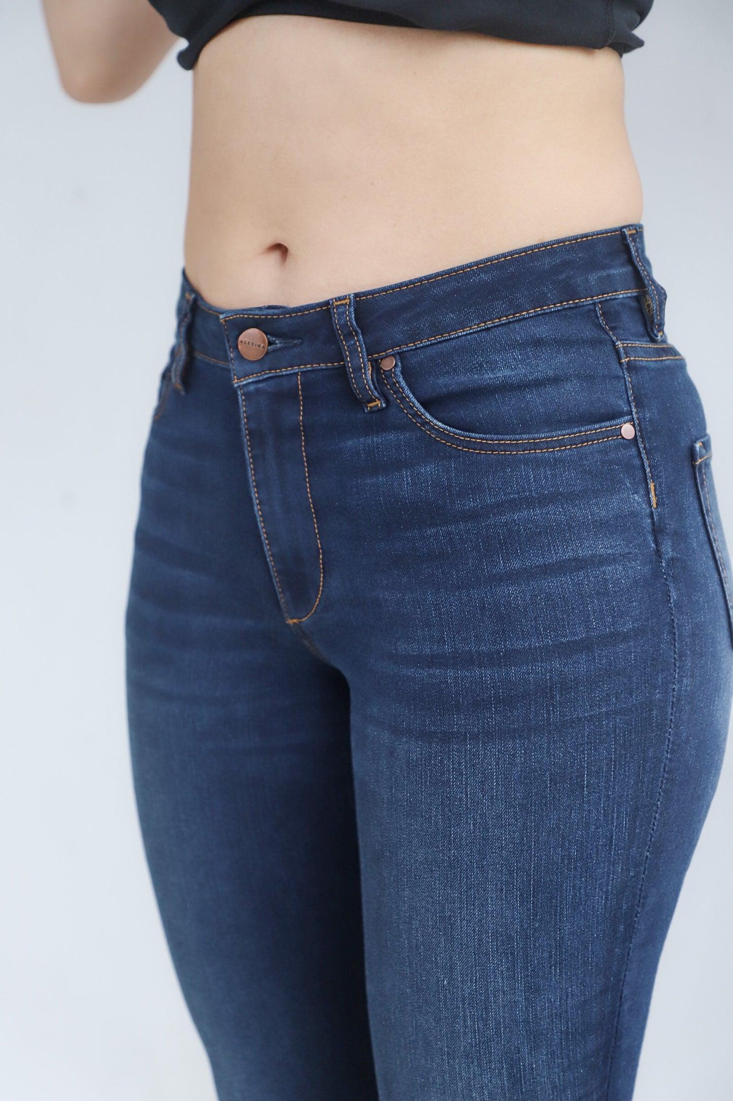 Close up picture of the Power Jeans showing how the jeans fit the hips and do not gap at the waist. Made for the athletic body.